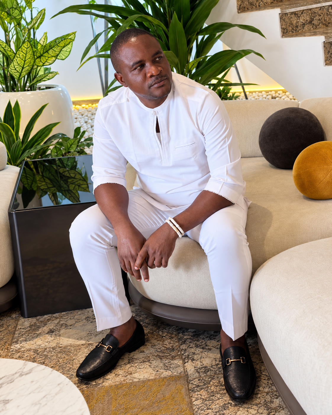 Portrait of Olisa Ernest Onyeka dressed in white